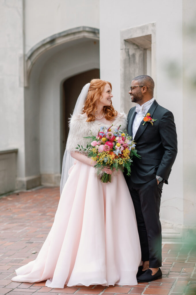 atlanta couple with bride wearing pink wedding dress