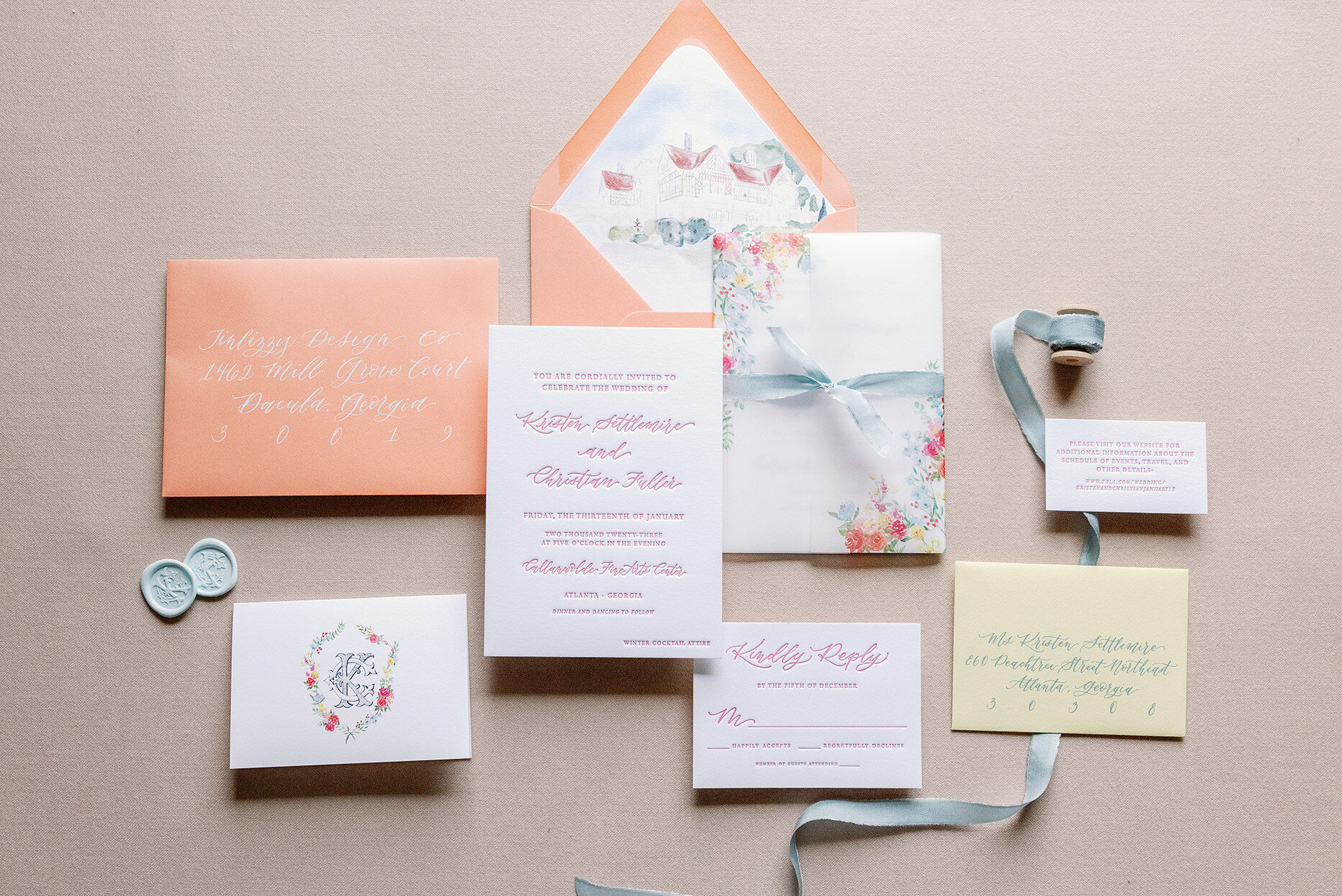 custom wedding invitation suite with bright florals and coral envelopes