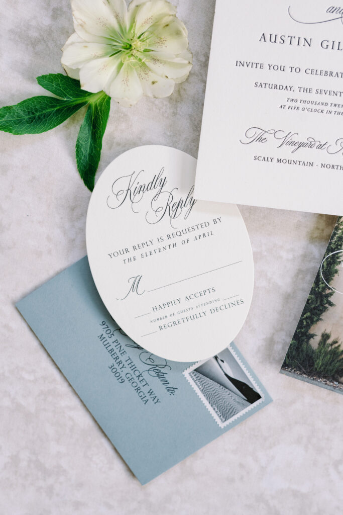 Die cut reply card for wedding invitation