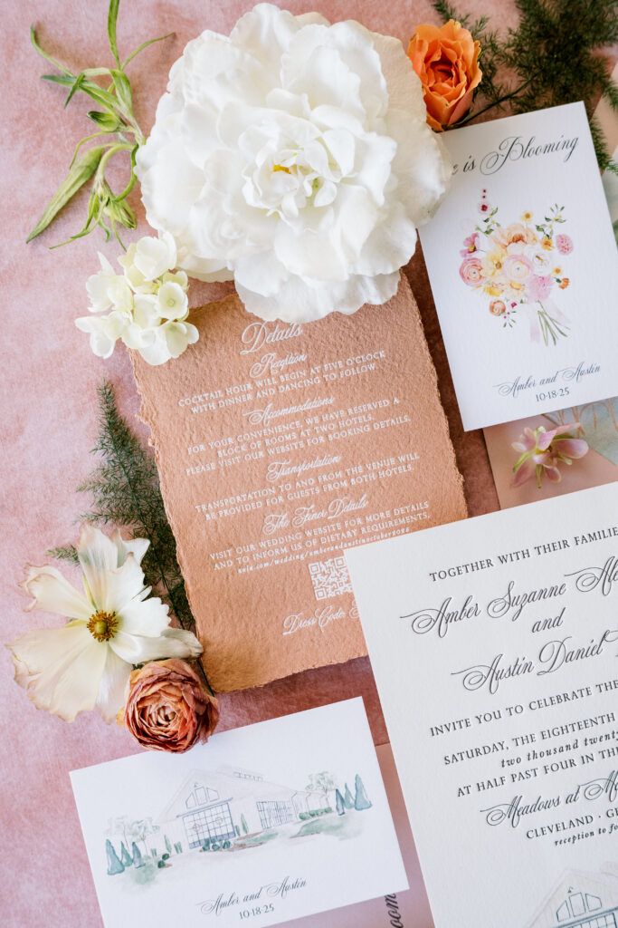 Handmade paper wedding invitation with white foil
