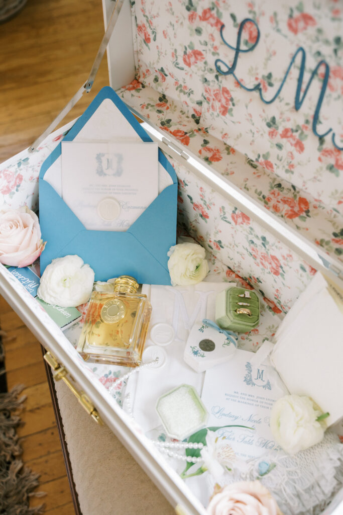 Mid blue and blush wedding invitation suite in North Georgia