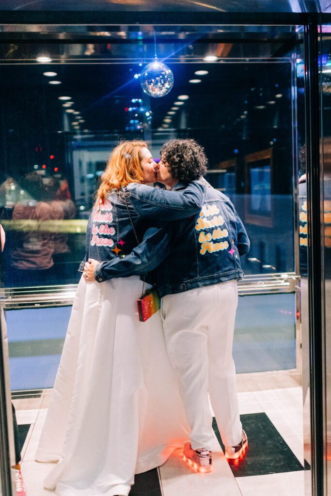 The couple in the Ventanas elevator with matching denim jackets