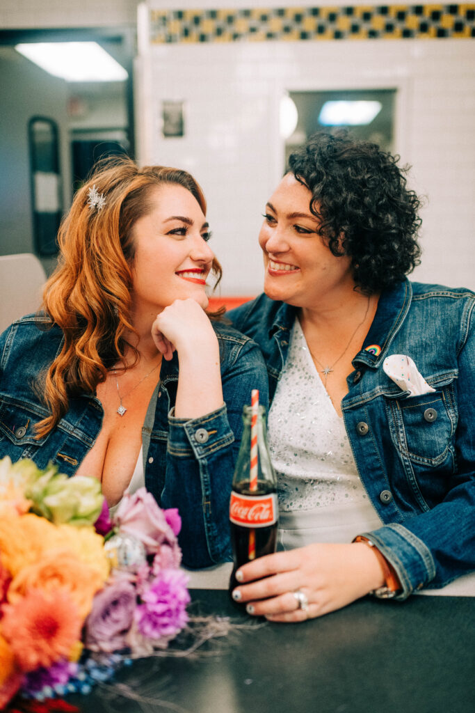 Brittany and Julie at Waffle House after their wedding