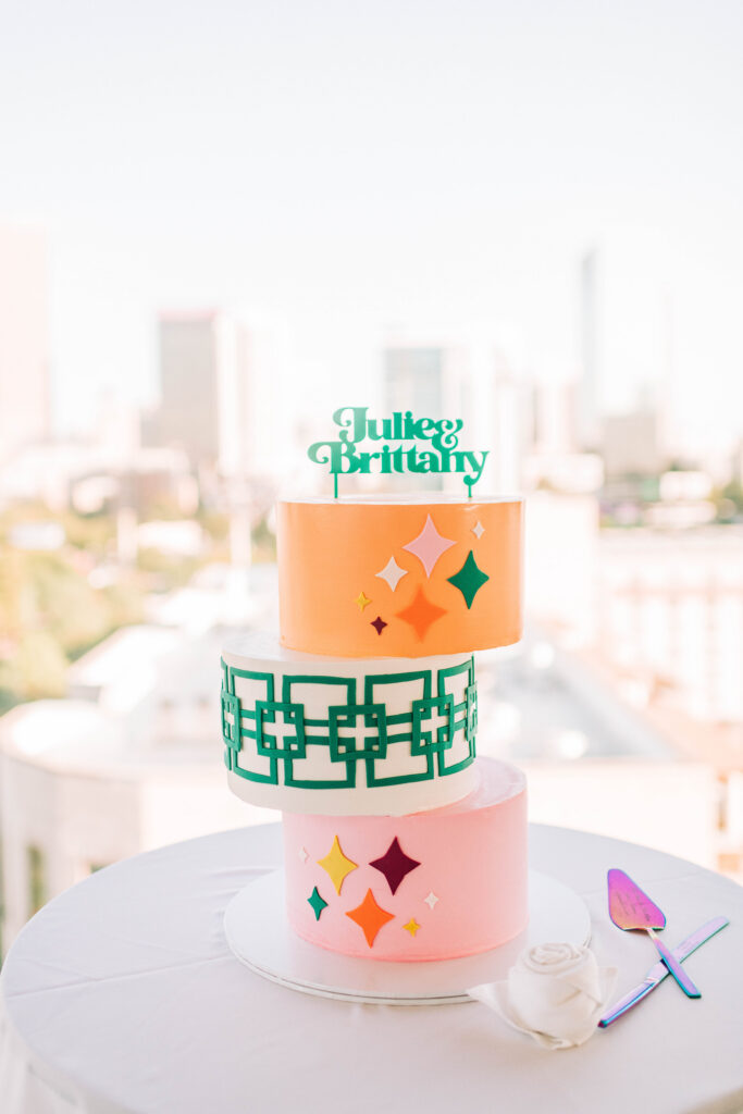 Tiered themed retro cake for Julie and Brittany's wedding